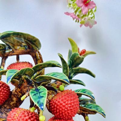 TƯỢNG SỨ THỦ CÔNG CÂY VẢI – BIỂU TƯỢNG TÀI LỘC & SUNG TÚC